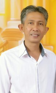 Camat Banawa Selatan, Hasan